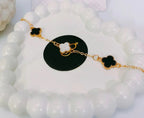 Golden Four-Leaf Clover Bracelet – Reversible Black & White Mother-of-Pearl Style Lucky Charm Jewelry